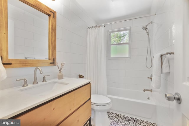 bathroom featuring toilet, tile patterned floors, shower / tub combo with curtain, and vanity