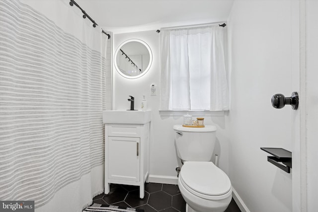 6 Birkshire Rd, Hamilton, NJ 08619 - full bathroom featuring vanity, baseboards, toilet, and tile patterned flooring