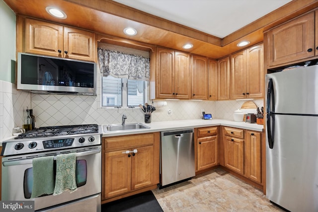 6 Birkshire Rd, Hamilton, NJ 08619 - kitchen with decorative backsplash, light countertops, a sink, and appliances with stainless steel finishes