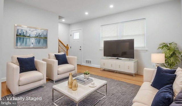 5011 37th Ave, Hyattsville, MD 20782 - living room featuring visible vents, recessed lighting, wood finished floors, stairs, and baseboards