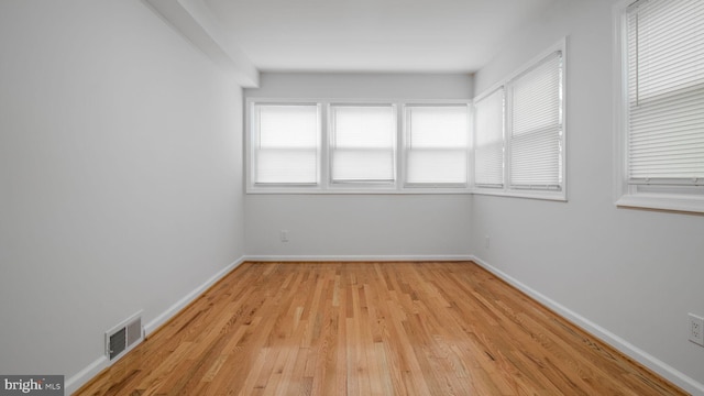 5011 37th Ave, Hyattsville, MD 20782 - unfurnished room with light wood finished floors, baseboards, and visible vents