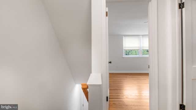 5011 37th Ave, Hyattsville, MD 20782 - corridor with baseboards, an upstairs landing, and wood finished floors
