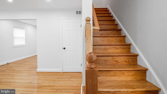 5011 37th Ave, Hyattsville, MD 20782 - stairway with visible vents, baseboards, and wood finished floors