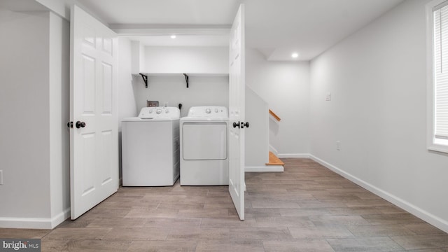 5011 37th Ave, Hyattsville, MD 20782 - laundry area with baseboards, separate washer and dryer, laundry area, recessed lighting, and light wood finished floors