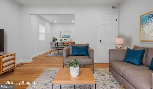5011 37th Ave, Hyattsville, MD 20782 - living area with light wood-style flooring, baseboards, visible vents, and recessed lighting