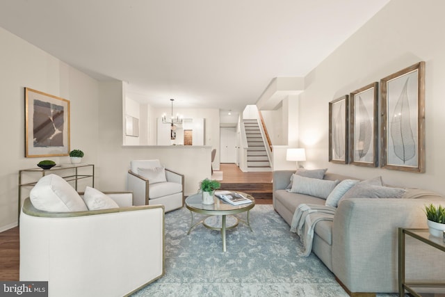 11116 Boathouse Ct Unit 93, Reston, VA 20191 - living area featuring wood finished floors, a chandelier, and stairway