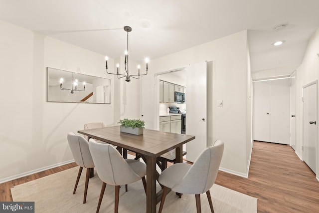 11116 Boathouse Ct Unit 93, Reston, VA 20191 - dining area with a chandelier, light wood-style flooring, baseboards, and recessed lighting