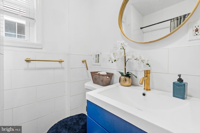 1652 S Ringgold St, Philadelphia, PA 19145 - bathroom featuring tile walls and vanity
