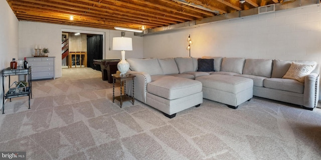 living room featuring visible vents and carpet flooring