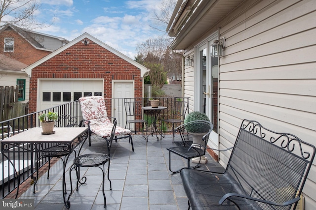 view of patio / terrace with a garage