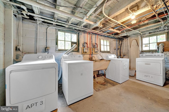 24 Montague Ave, Ewing, NJ 08628 - laundry room with washing machine and clothes dryer, laundry area, and a wealth of natural light