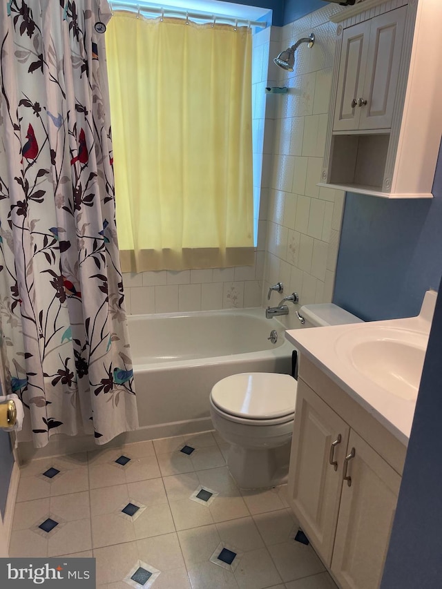 bathroom with vanity, tile patterned floors, toilet, and shower / bathtub combination with curtain