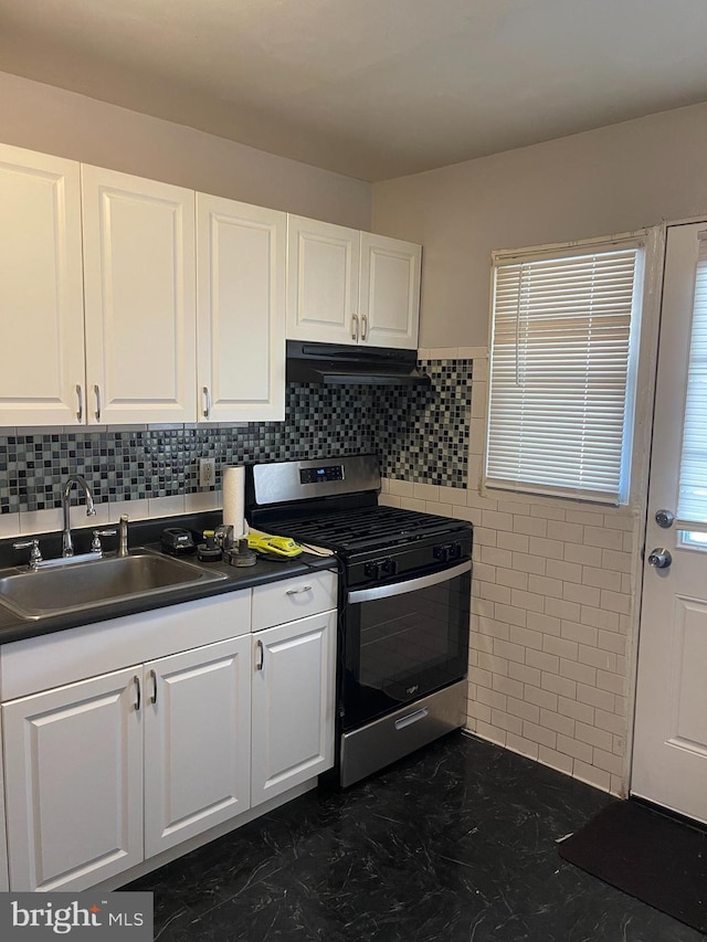 17 Haley Rd, Baltimore, MD 21221 - kitchen with dark countertops, a sink, gas stove, white cabinetry, and under cabinet range hood