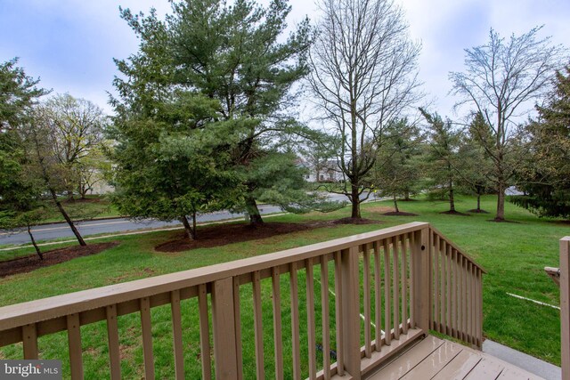 deck featuring a yard