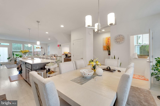 dining room with recessed lighting