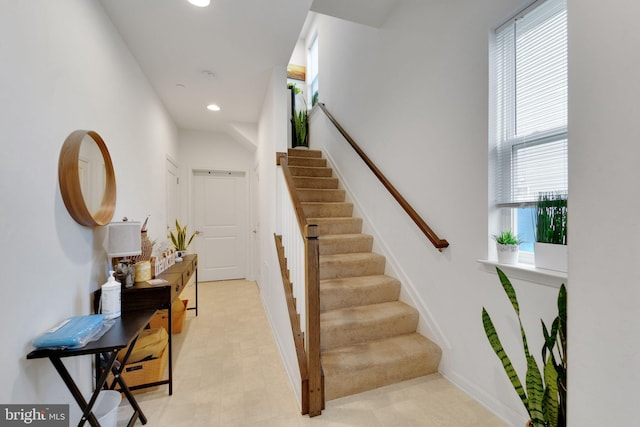 stairs featuring recessed lighting and baseboards