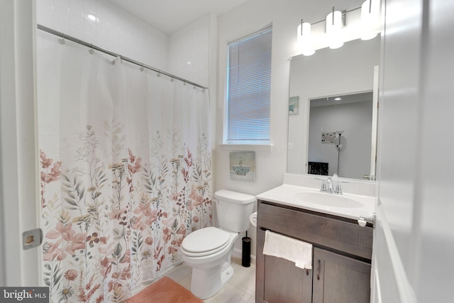 full bath featuring toilet, vanity, tile patterned flooring, and a shower with shower curtain
