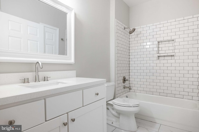 full bath with vanity, marble finish floor, toilet, and tub / shower combination