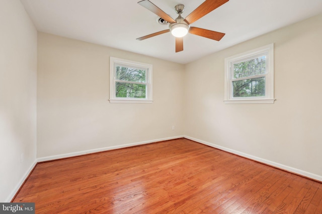 9532 Sherwood Dr, Upper Marlboro, MD 20772 - unfurnished room with baseboards, wood-type flooring, and a ceiling fan
