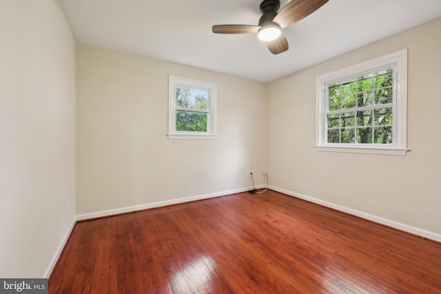 9532 Sherwood Dr, Upper Marlboro, MD 20772 - unfurnished room with plenty of natural light, baseboards, ceiling fan, and hardwood / wood-style floors