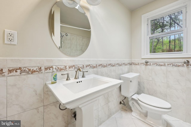 9532 Sherwood Dr, Upper Marlboro, MD 20772 - bathroom featuring tile walls, tile patterned flooring, a wainscoted wall, and toilet