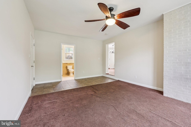 9532 Sherwood Dr, Upper Marlboro, MD 20772 - carpeted spare room with a ceiling fan, tile patterned floors, and baseboards