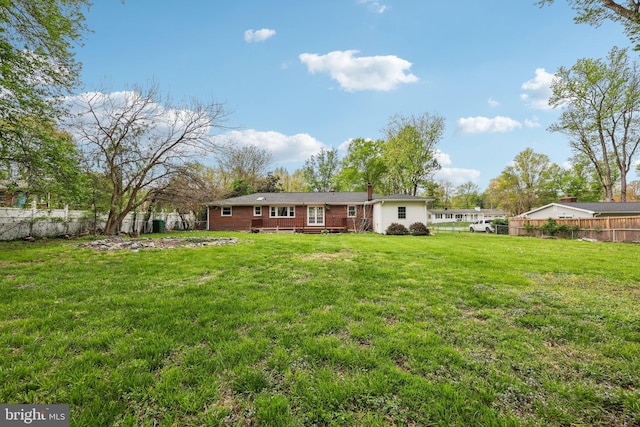 9532 Sherwood Dr, Upper Marlboro, MD 20772 - back of property with a lawn and fence private yard