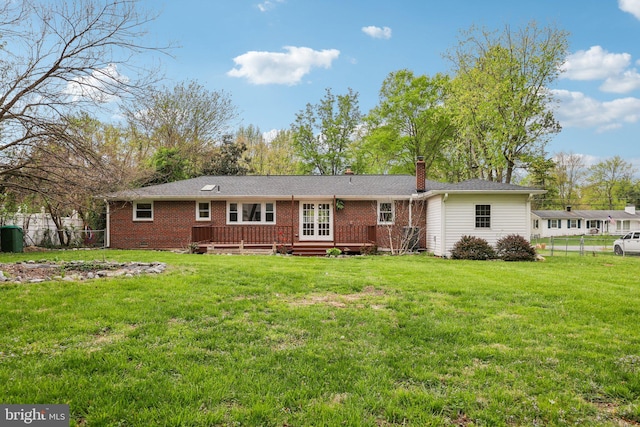 9532 Sherwood Dr, Upper Marlboro, MD 20772 - rear view of house with a chimney, a lawn, a wooden deck, brick siding, and fence