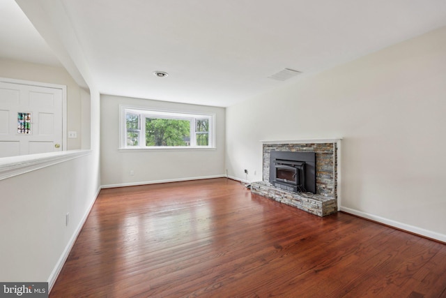 9532 Sherwood Dr, Upper Marlboro, MD 20772 - unfurnished living room featuring baseboards, wood finished floors, and visible vents
