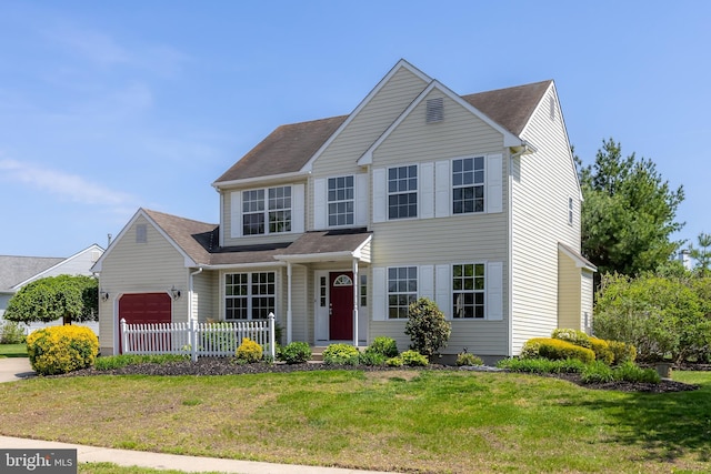 view of front facade with roof with shingles, an attached garage, and a front lawn