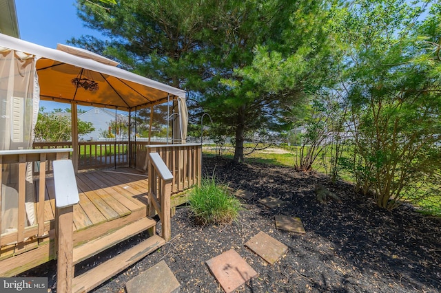 wooden deck with a gazebo