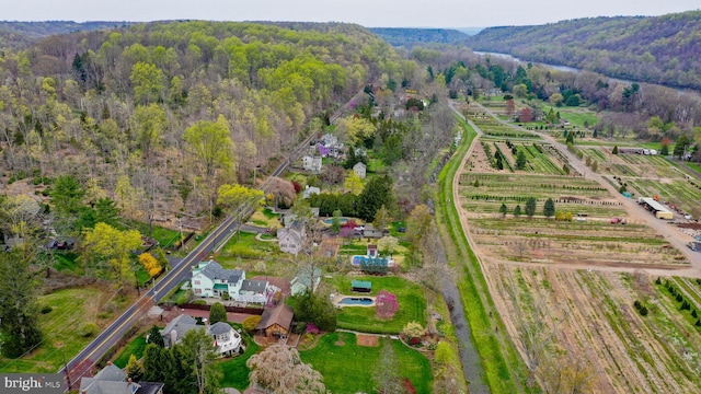 aerial view featuring a view of trees