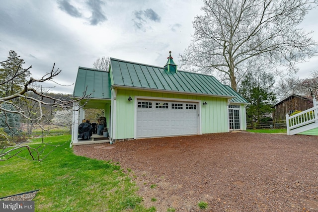 garage featuring driveway