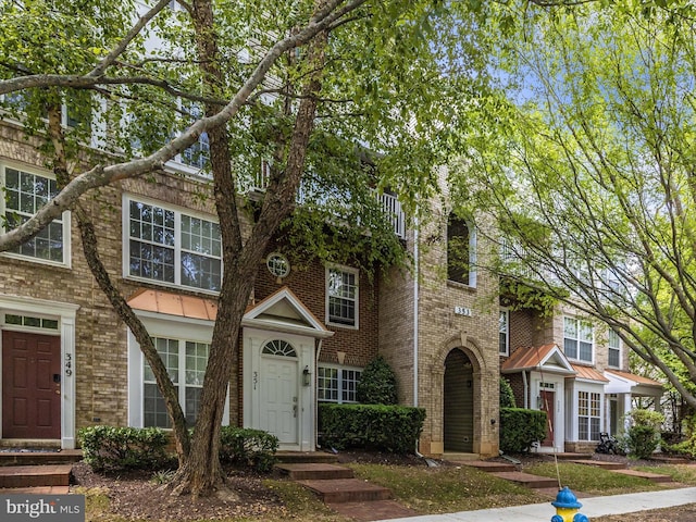 353 Fallsgrove Dr Unit 51, Rockville, MD 20850 - townhome / multi-family property featuring brick siding