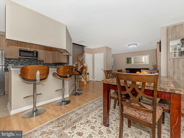 353 Fallsgrove Dr Unit 51, Rockville, MD 20850 - dining space featuring light wood-type flooring