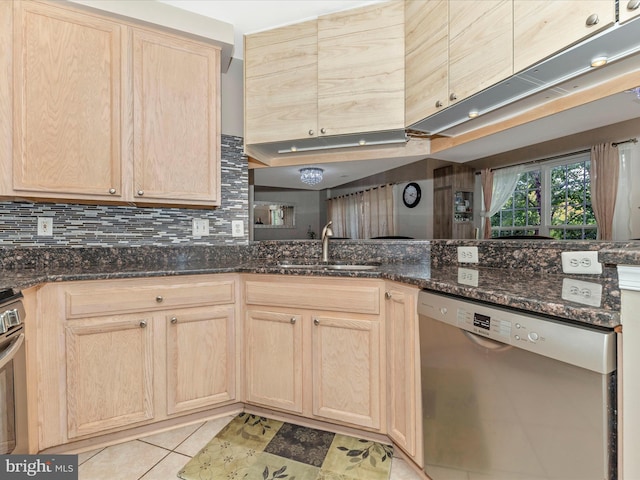 353 Fallsgrove Dr Unit 51, Rockville, MD 20850 - kitchen featuring a sink, stainless steel appliances, light brown cabinetry, and tasteful backsplash