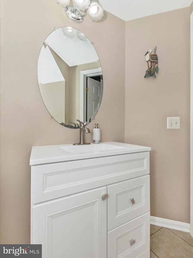 353 Fallsgrove Dr Unit 51, Rockville, MD 20850 - bathroom featuring tile patterned floors, vanity, a notable chandelier, and baseboards