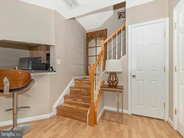 353 Fallsgrove Dr Unit 51, Rockville, MD 20850 - stairs featuring baseboards, visible vents, and wood finished floors