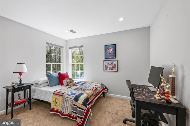 carpeted bedroom featuring recessed lighting, visible vents, and baseboards