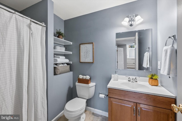 full bath featuring baseboards, toilet, and vanity