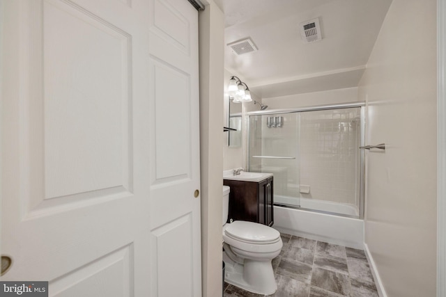 1465 N Van Dorn St, Alexandria, VA 22304 - bathroom featuring toilet, visible vents, shower / bath combination with glass door, and vanity