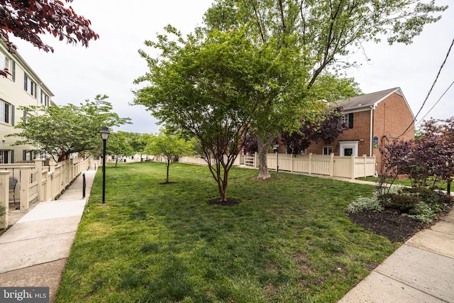 1465 N Van Dorn St, Alexandria, VA 22304 - view of community featuring a lawn and fence