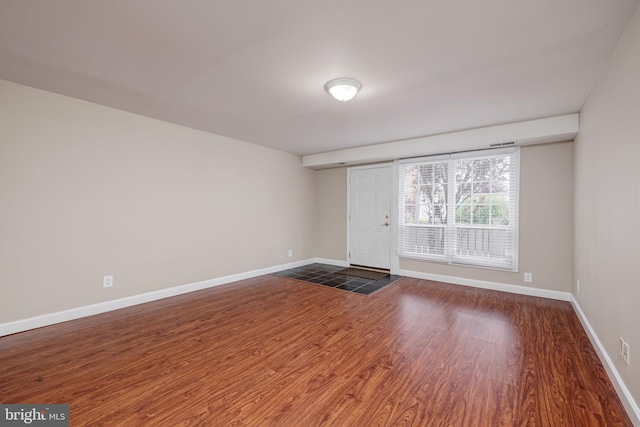 1465 N Van Dorn St, Alexandria, VA 22304 - unfurnished room featuring dark wood-style floors and baseboards