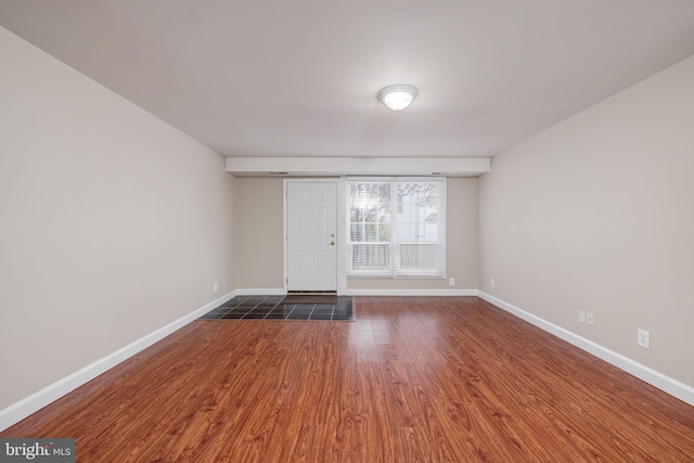 1465 N Van Dorn St, Alexandria, VA 22304 - empty room with baseboards and dark wood-style flooring