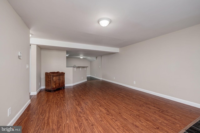 1465 N Van Dorn St, Alexandria, VA 22304 - finished basement with dark wood-style flooring and baseboards