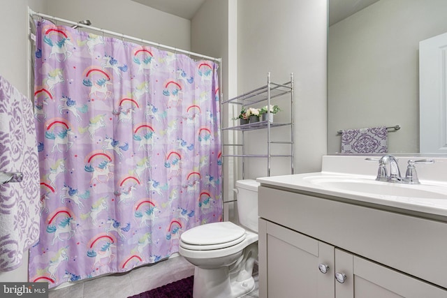 bathroom featuring a shower with shower curtain, toilet, tile patterned flooring, and vanity