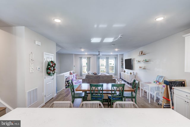 dining room with visible vents, wood finished floors, recessed lighting, and a ceiling fan