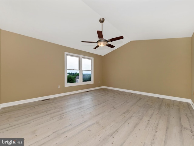 6093 Baldridge Ct, Frederick, MD 21701 - empty room with lofted ceiling, ceiling fan, light wood-type flooring, and baseboards