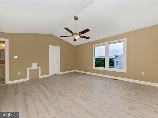 6093 Baldridge Ct, Frederick, MD 21701 - unfurnished room with ceiling fan, light wood-style floors, vaulted ceiling, and baseboards