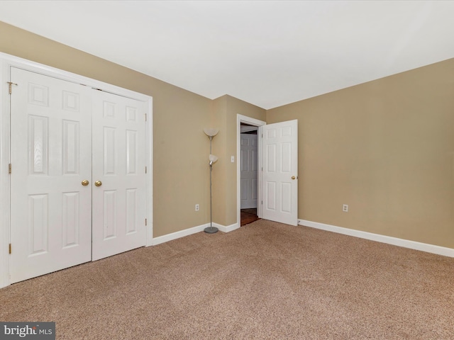 6093 Baldridge Ct, Frederick, MD 21701 - unfurnished bedroom featuring carpet floors, baseboards, and a closet